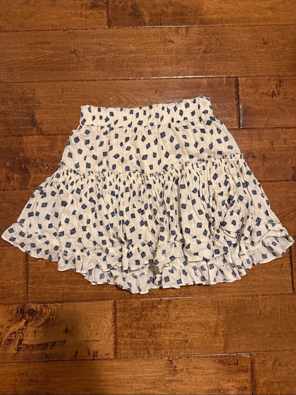 Misa Cream Ruffled Mini Skirt with Blue Print